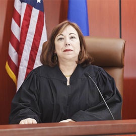 Caucasian female judge in the courtroom.