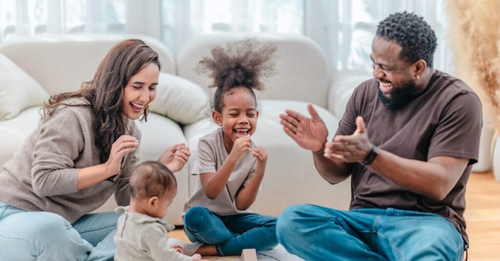 How can parents and caregivers be supported in developing a positive co-parenting relationship?